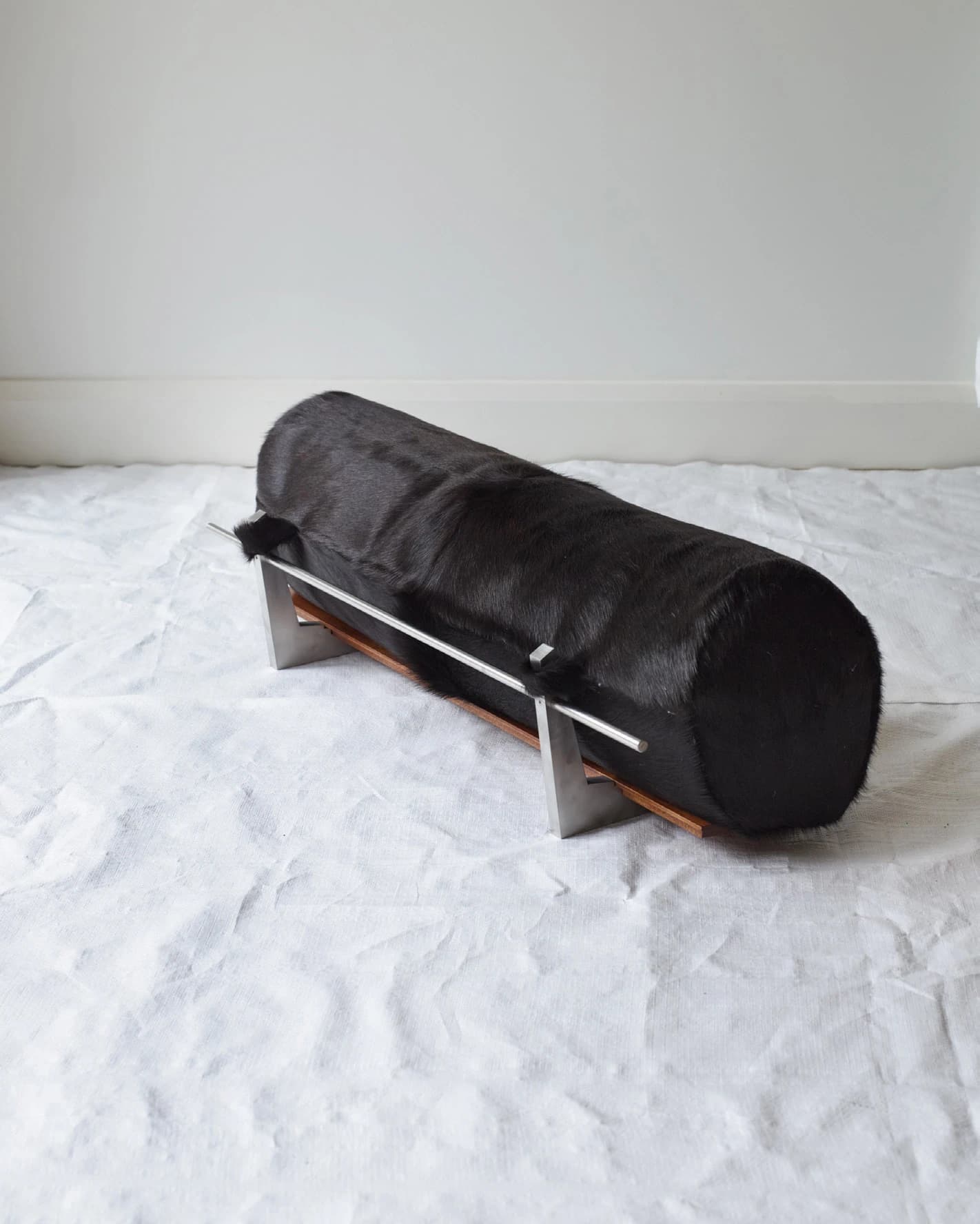 The Architectural Completion of a Floor Bolster Cushion – Brown