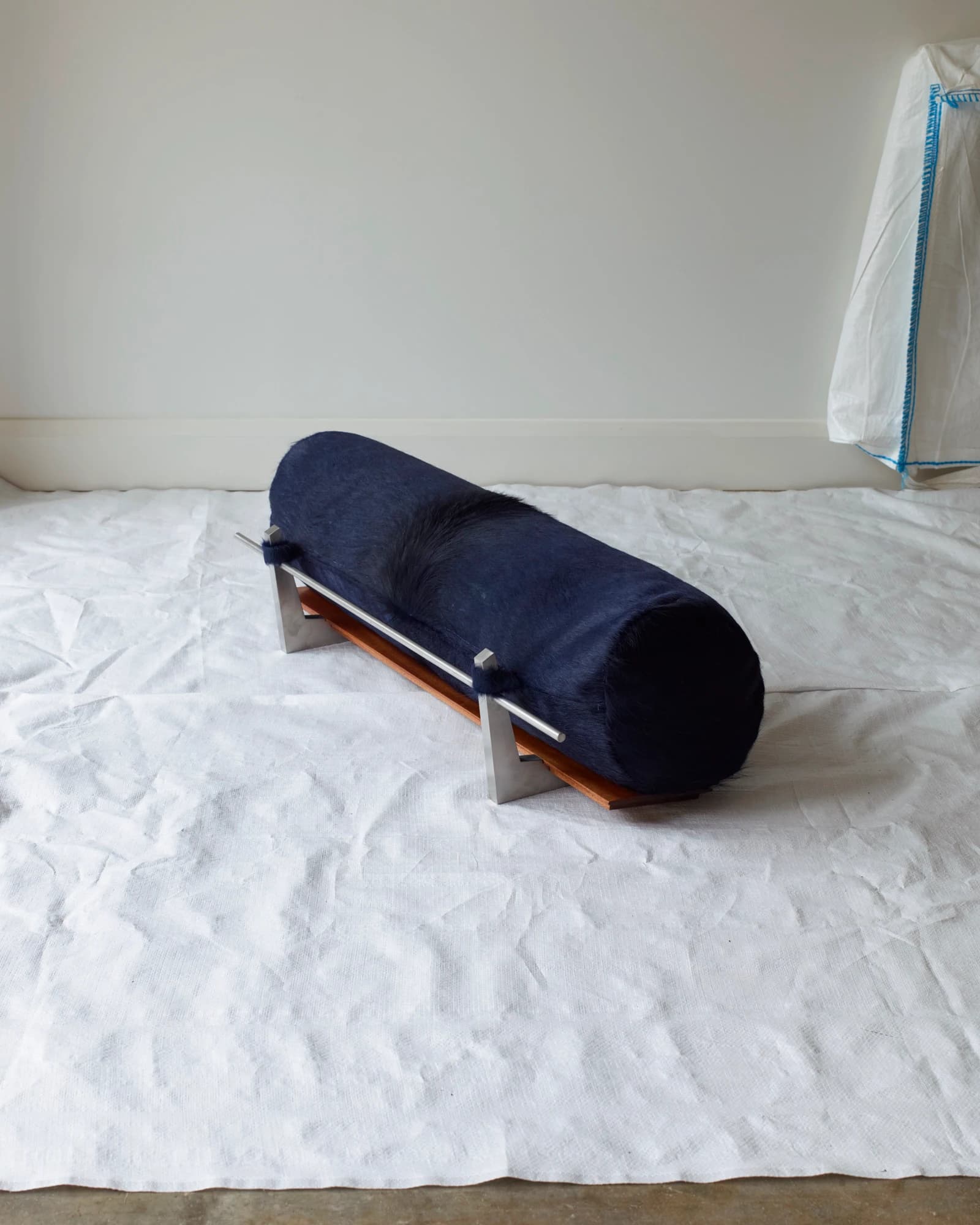 The Architectural Completion of a Floor Bolster Cushion – Blue